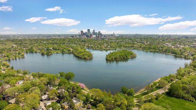 bird's eye view featuring a water view and a view of city