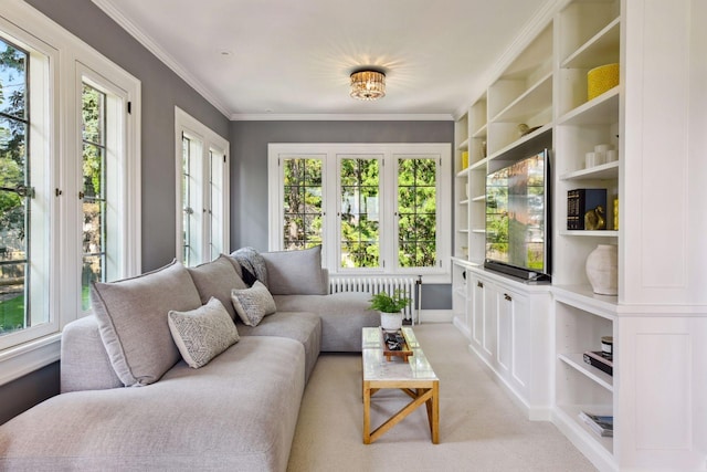 sunroom with radiator heating unit and french doors