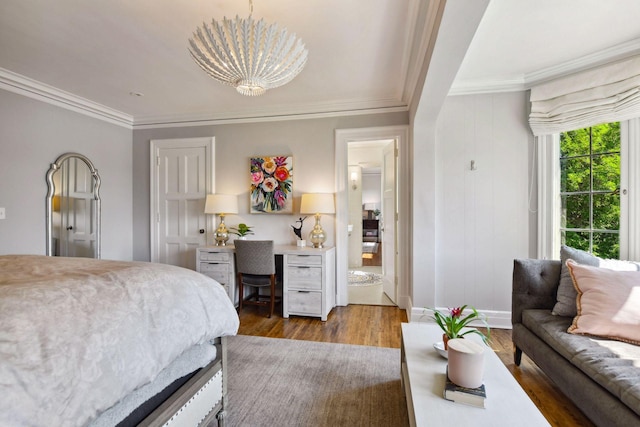 bedroom with hardwood / wood-style floors and crown molding