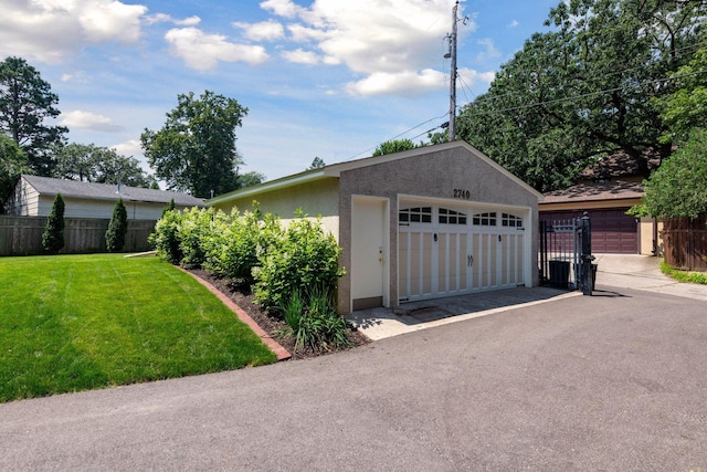 garage with a lawn