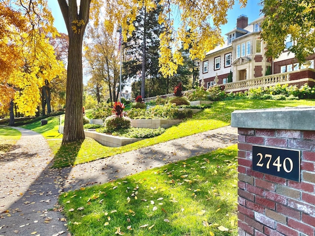 view of community featuring a yard