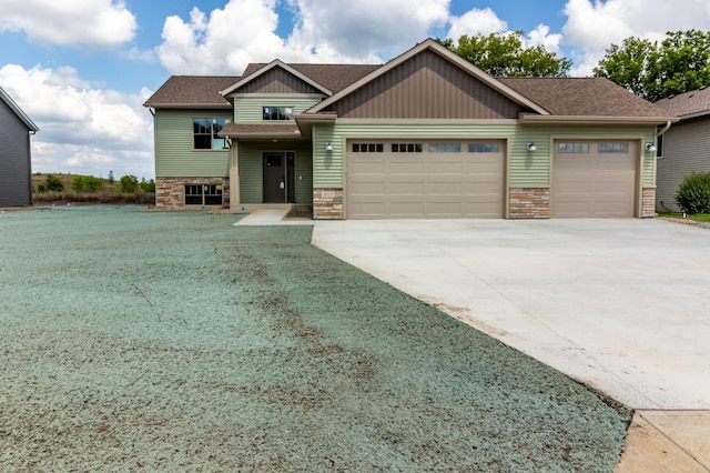 craftsman-style home with a garage