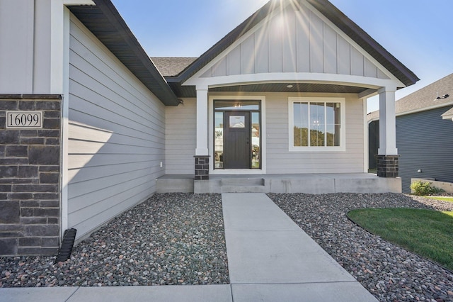 property entrance featuring covered porch