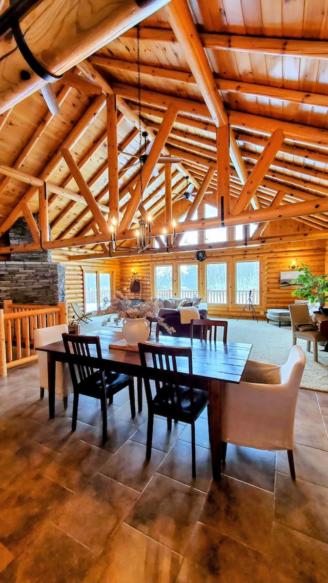 28419 220th St, Shevlin, MN 56676 - dining room featuring wooden ceiling, healthy amount of natural light, beam ceiling, high vaulted ceiling, and wooden walls