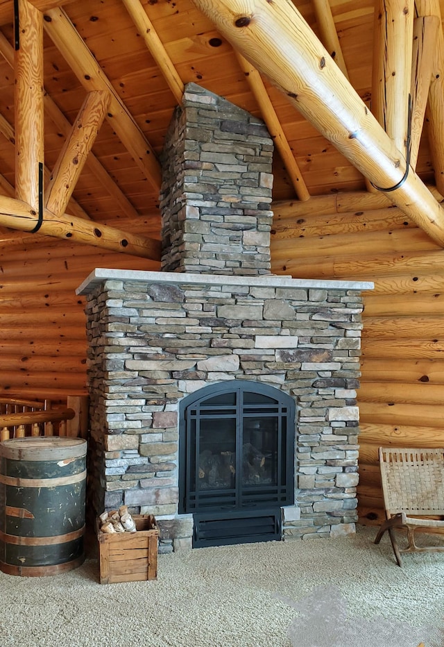 28419 220th St, Shevlin, MN 56676 - detailed view of rustic walls, carpet floors, beam ceiling, a stone fireplace, and wood ceiling