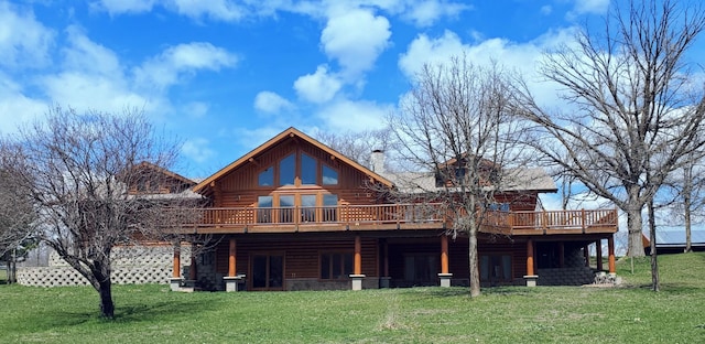 28419 220th St, Shevlin, MN 56676 - rear view of house with a wooden deck, log exterior, a lawn, and a chimney