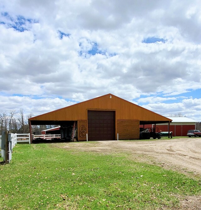 28419 220th St, Shevlin, MN 56676 - view of pole building featuring driveway