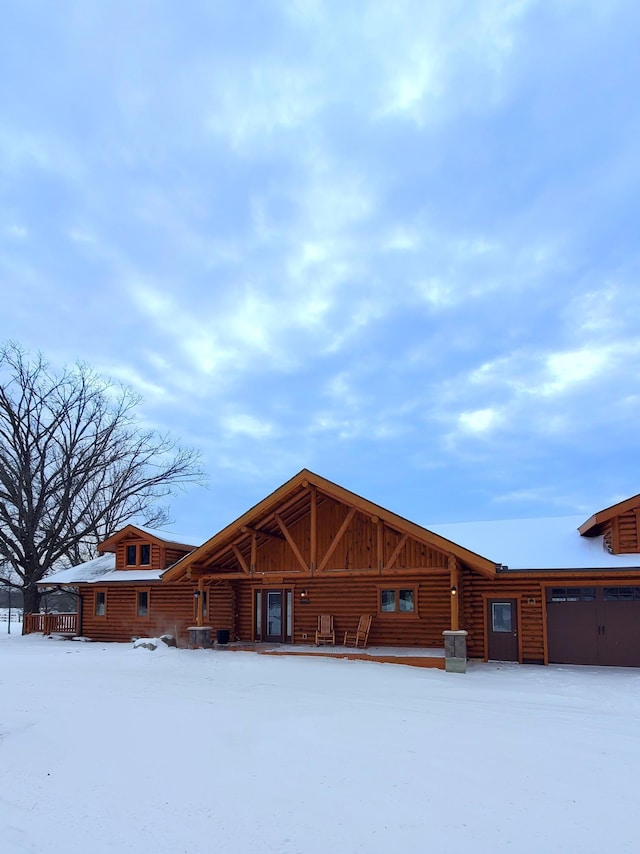 28419 220th St, Shevlin, MN 56676 - view of front of house featuring board and batten siding and faux log siding