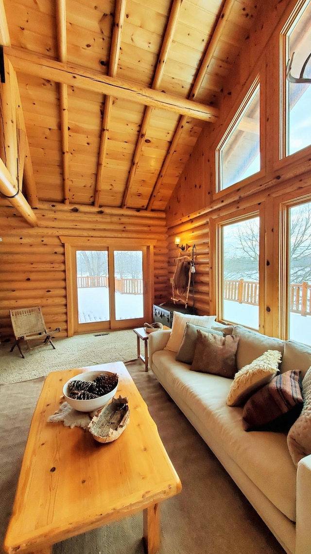 28419 220th St, Shevlin, MN 56676 - living room featuring log walls, wood ceiling, high vaulted ceiling, and beam ceiling