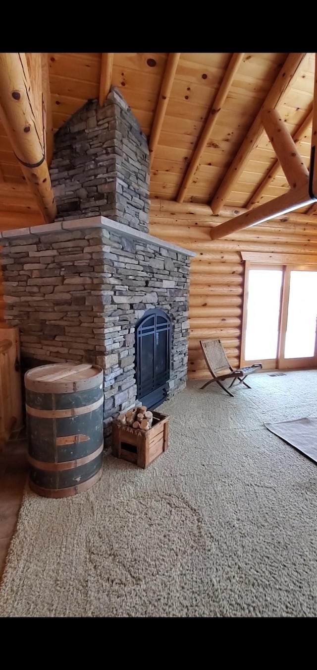 28419 220th St, Shevlin, MN 56676 - unfurnished living room featuring rustic walls, wooden ceiling, a fireplace, and carpet flooring