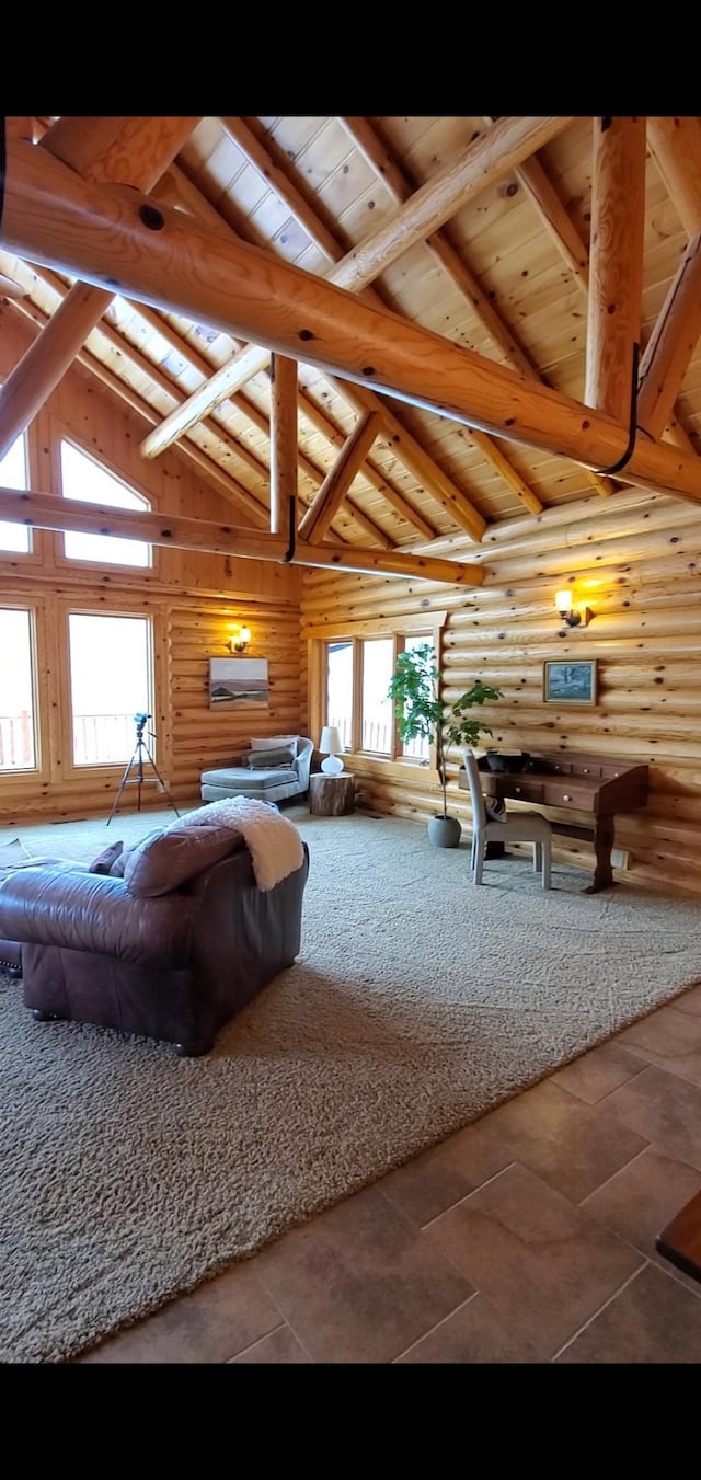 28419 220th St, Shevlin, MN 56676 - tiled living room featuring log walls, beam ceiling, high vaulted ceiling, and wooden ceiling