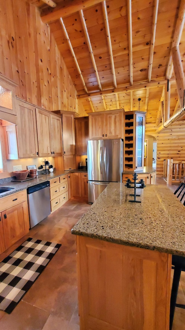 28419 220th St, Shevlin, MN 56676 - kitchen featuring stainless steel appliances, high vaulted ceiling, light stone counters, wood ceiling, and a kitchen island