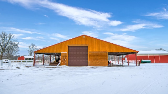 28419 220th St, Shevlin, MN 56676 - snow covered structure with an outbuilding and fence