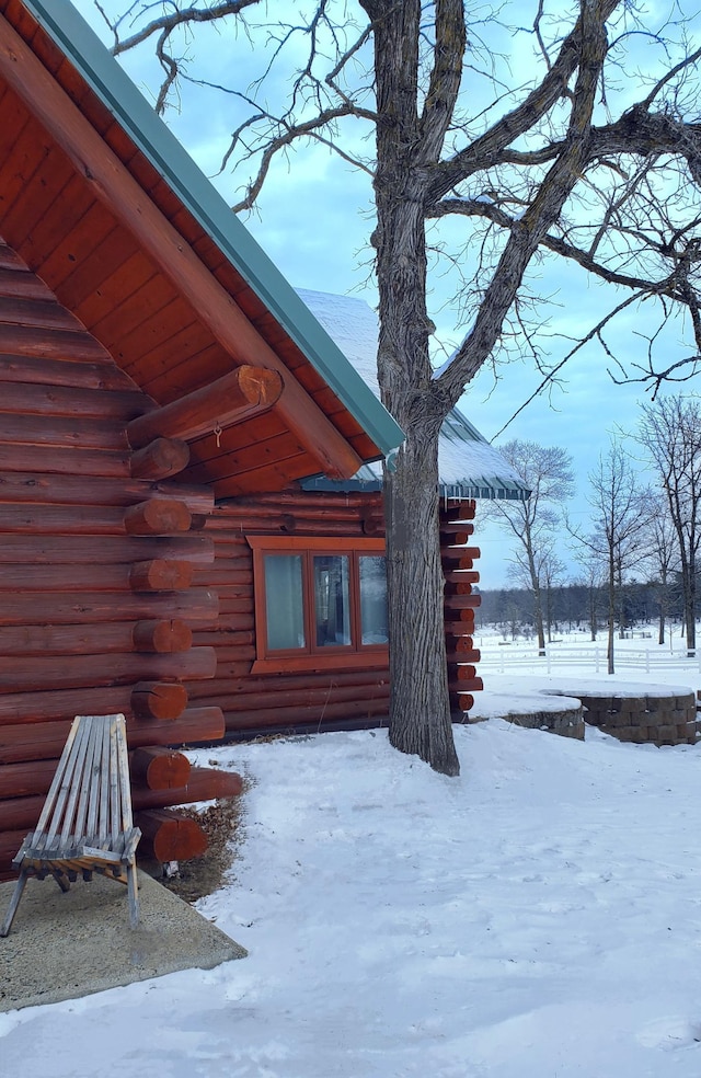 28419 220th St, Shevlin, MN 56676 - view of snow covered exterior featuring log exterior
