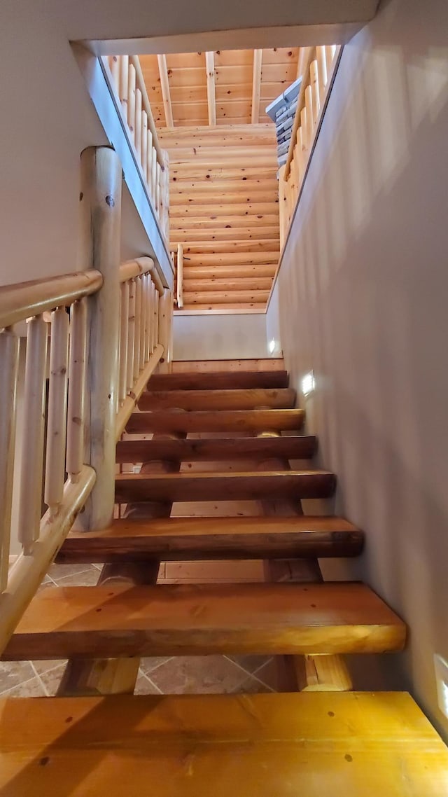 28419 220th St, Shevlin, MN 56676 - stairs with wood ceiling and tile patterned floors