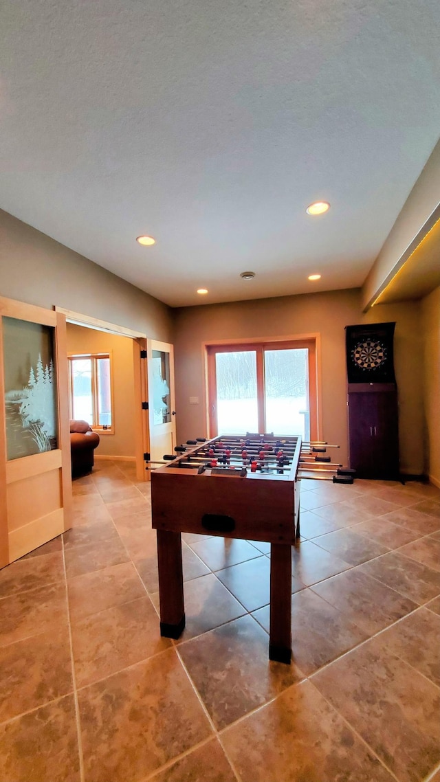 28419 220th St, Shevlin, MN 56676 - playroom featuring light tile patterned flooring, baseboards, and recessed lighting