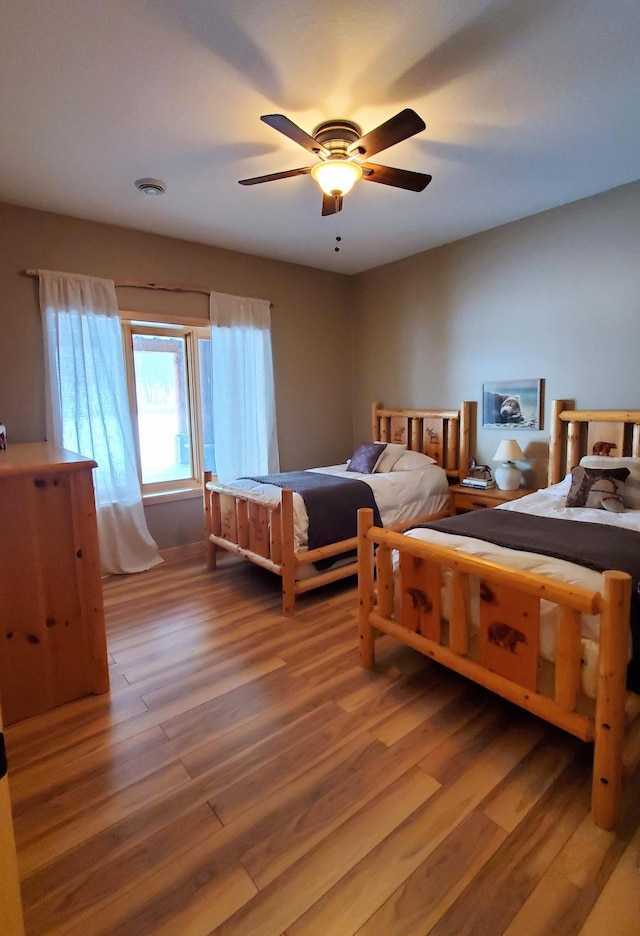 28419 220th St, Shevlin, MN 56676 - bedroom featuring wood finished floors and a ceiling fan