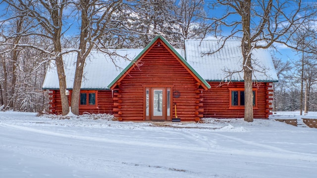 28419 220th St, Shevlin, MN 56676 - view of front of property with log exterior and metal roof