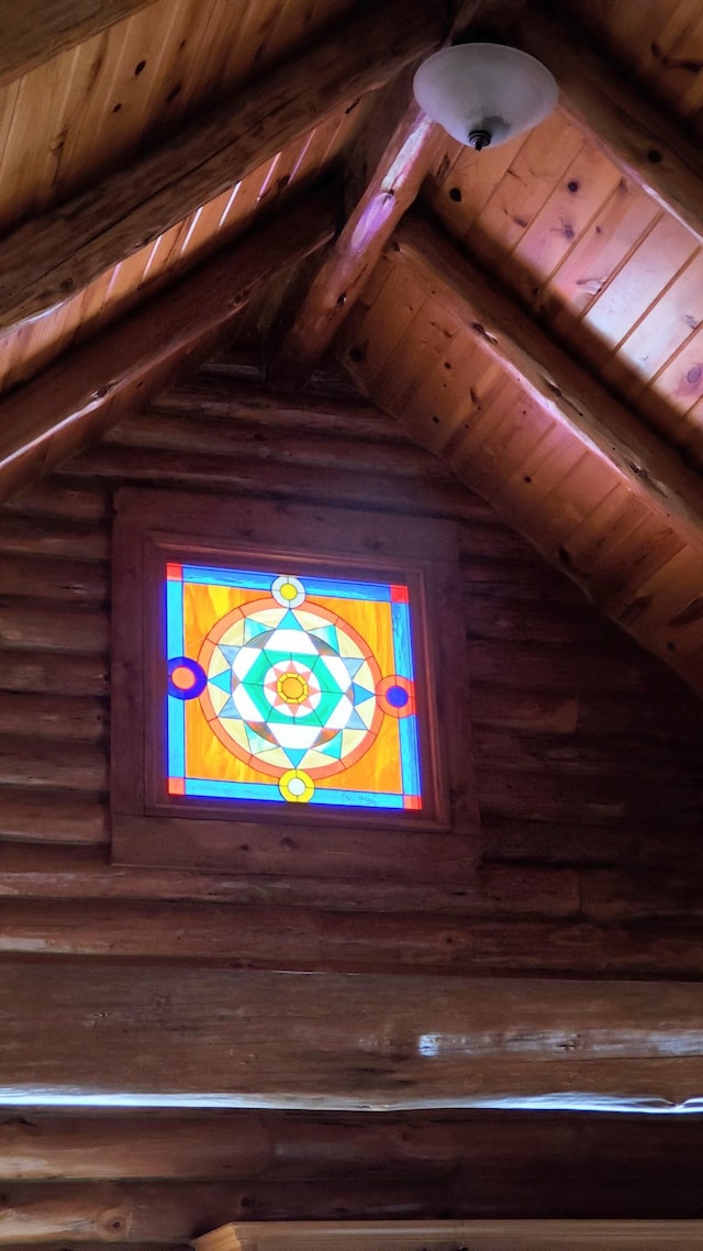 28419 220th St, Shevlin, MN 56676 - detailed view of log walls, wood ceiling, and beam ceiling