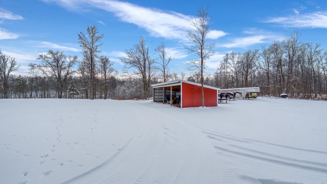 28419 220th St, Shevlin, MN 56676 - snowy yard featuring an outbuilding