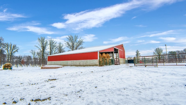 28419 220th St, Shevlin, MN 56676 - snow covered structure featuring an outbuilding and an outdoor structure