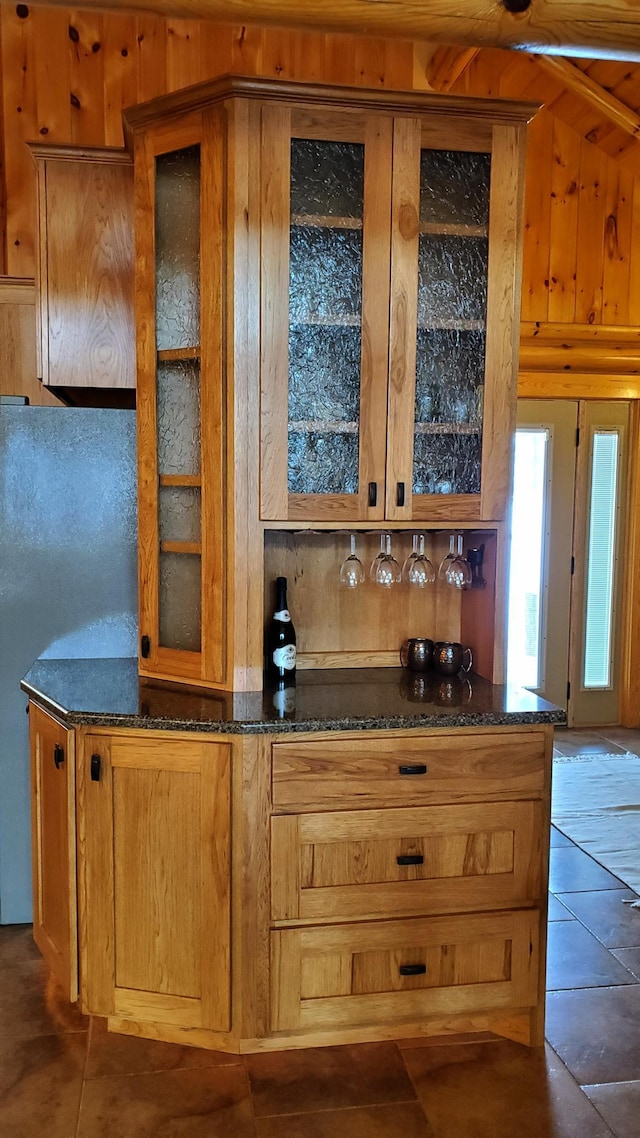 28419 220th St, Shevlin, MN 56676 - indoor dry bar with tile patterned floors and freestanding refrigerator