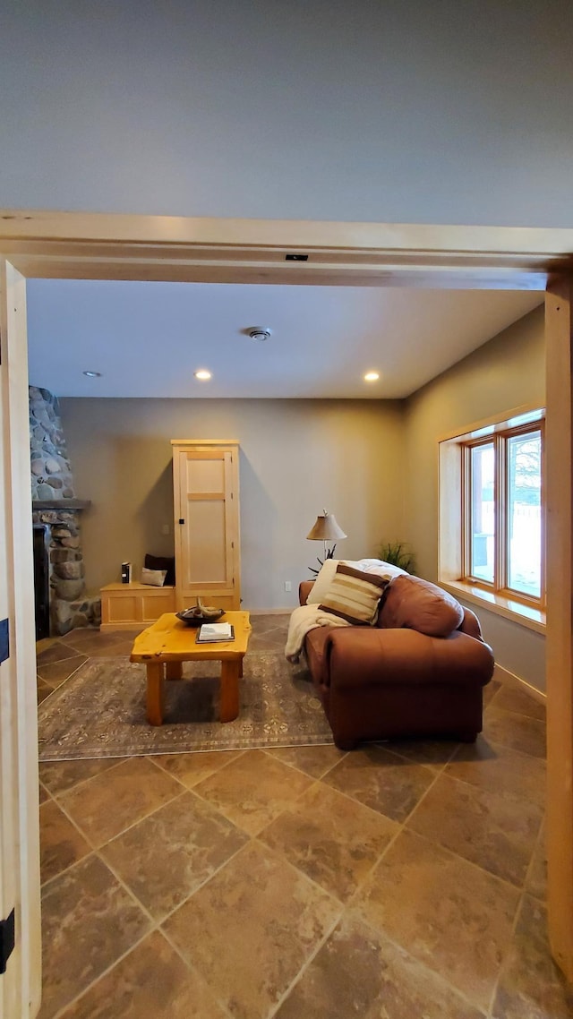 28419 220th St, Shevlin, MN 56676 - living room featuring recessed lighting and a stone fireplace
