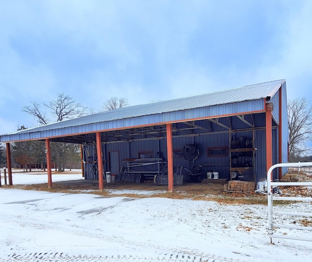 28419 220th St, Shevlin, MN 56676 - snow covered structure featuring an outbuilding, a carport, and an outdoor structure