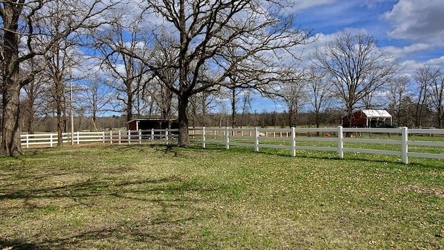 28419 220th St, Shevlin, MN 56676 - view of yard with an outdoor structure, a view of countryside, and a pole building