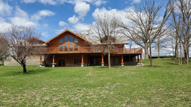 28419 220th St, Shevlin, MN 56676 - rear view of property with a wooden deck, a lawn, and a chimney