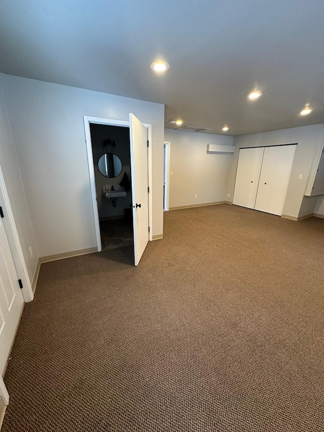 basement featuring carpet flooring