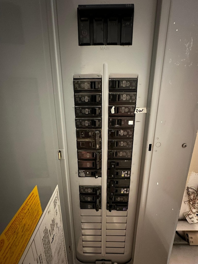 utility room featuring electric panel