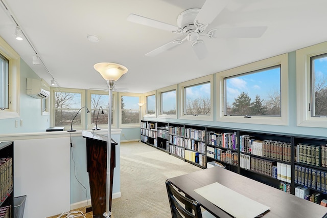 office area featuring sink, light carpet, ceiling fan, track lighting, and a wall mounted AC