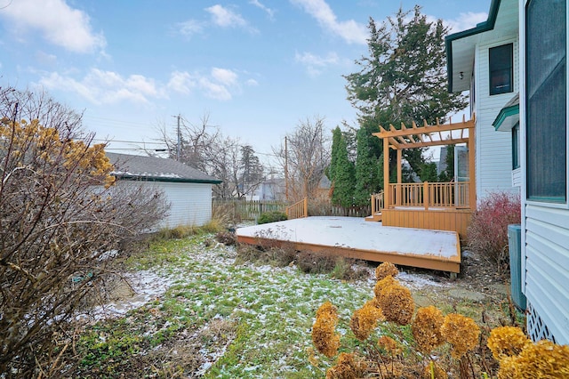 view of yard featuring a pergola, central AC, and a wooden deck