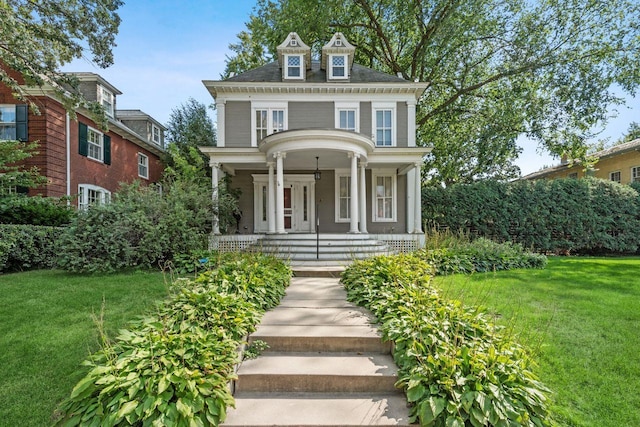 view of front of home with a front yard