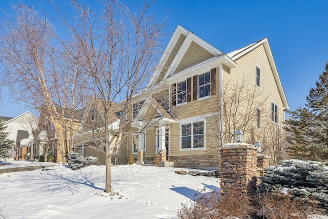 view of front of property featuring stone siding