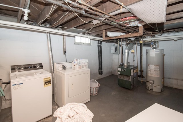 below grade area with washer and clothes dryer and gas water heater