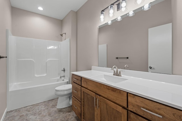 bathroom featuring vanity, toilet, and shower / bathtub combination