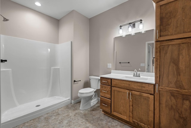 full bath featuring a walk in shower, toilet, and vanity