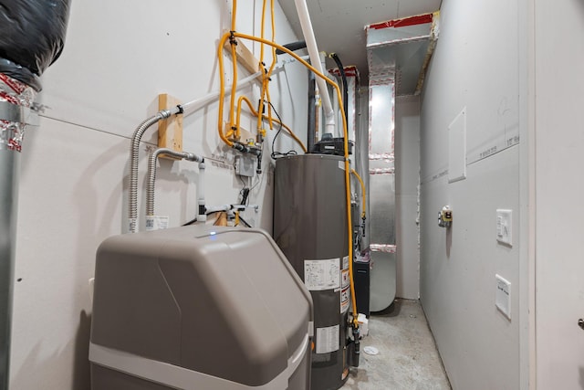 utility room featuring water heater