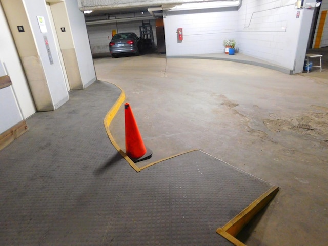 garage featuring a carport