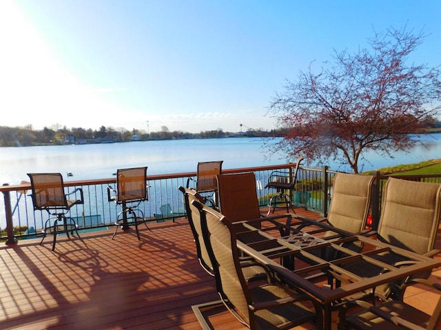 wooden terrace with a water view