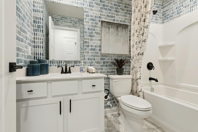 full bathroom featuring vanity, shower / bath combo with shower curtain, toilet, and tile walls