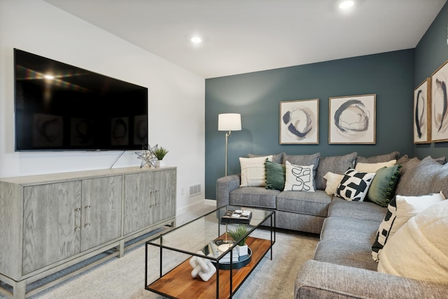 living room featuring light colored carpet