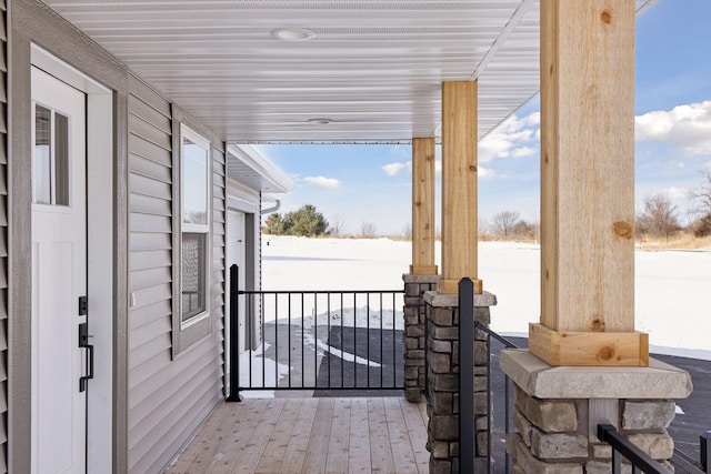 view of snow covered patio