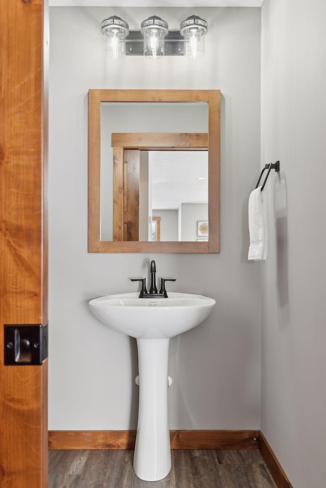 bathroom featuring hardwood / wood-style flooring