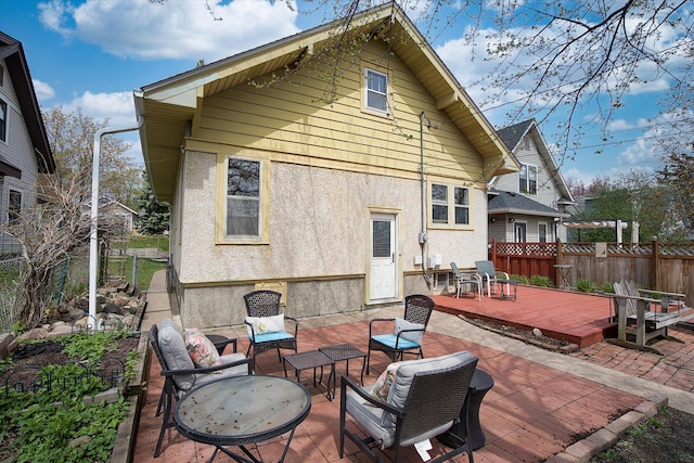 rear view of house with a deck