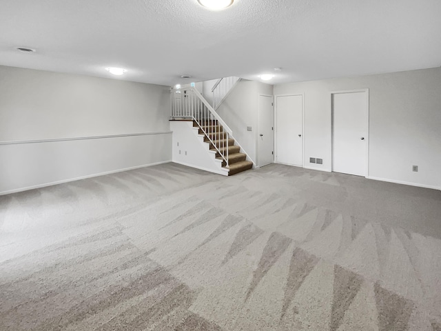 basement featuring carpet flooring