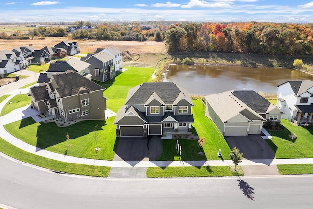 drone / aerial view with a water view