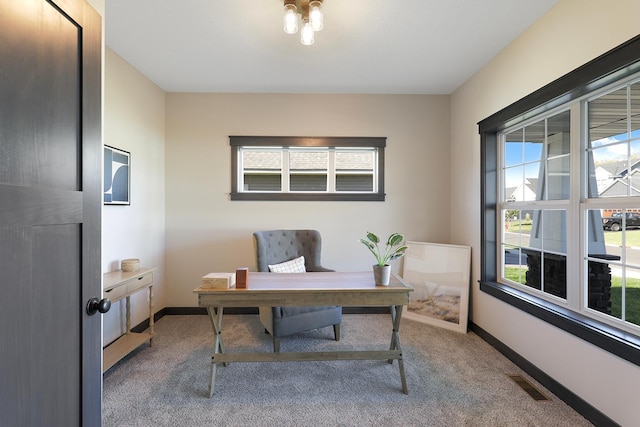 view of carpeted office space